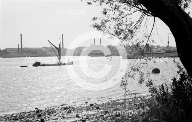 A Thames sailing barge on the River Thames at Tilbury, Essex, c1945-c1965.  Artist: SW Rawlings