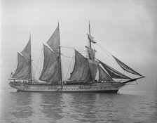 The steam yacht 'Wanderer' (later named 'Vagus') hoisting sails. Creator: Kirk & Sons of Cowes.