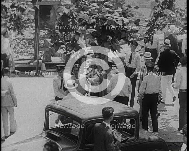 Police Officers Confronting Protesting Soldiers  To Disperse the Army Veterans, 1932. Creator: British Pathe Ltd.