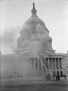U.S. Capitol - Cleaning Exterior, 1913. Creator: Harris & Ewing.