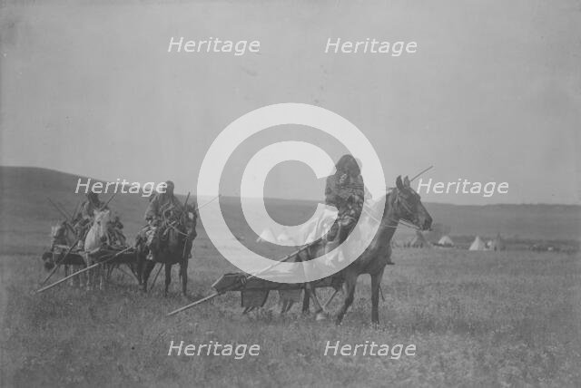 Moving camp-Atsina, c1908. Creator: Edward Sheriff Curtis.
