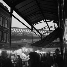 Street market in Electric Avenue, Brixton, London, 1962-1964. Artist: John Gay