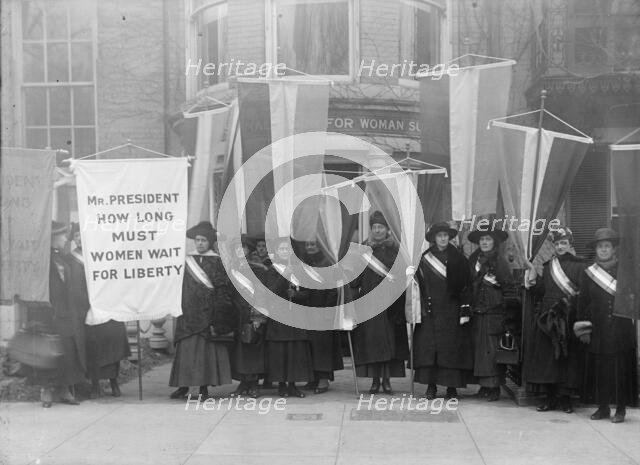 Woman Suffrage - Group Leaving Headquarters, 1917. Creator: Harris & Ewing.