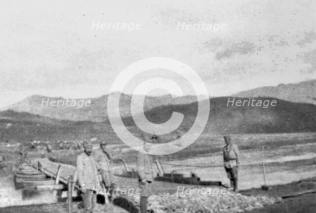 'Pont de bateaux sur la Tcherna pres de Skotchivir', 1916. Creator: Unknown.