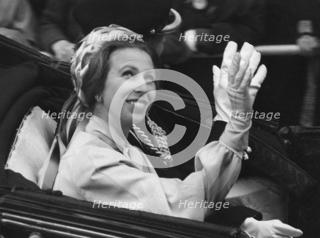Princess Anne waves on the way back to Buckingham palace from the Guildhall, 7th June 1977. Artist: Unknown