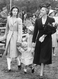 Crown Prince Carl Gustav with mother Sibylla and big sister Margaretha, Stockholm, 1947. 
 Creator: Unknown.