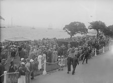 Spectators watching yachts at Cowes, Isle of Wight. Creator: Kirk & Sons of Cowes.