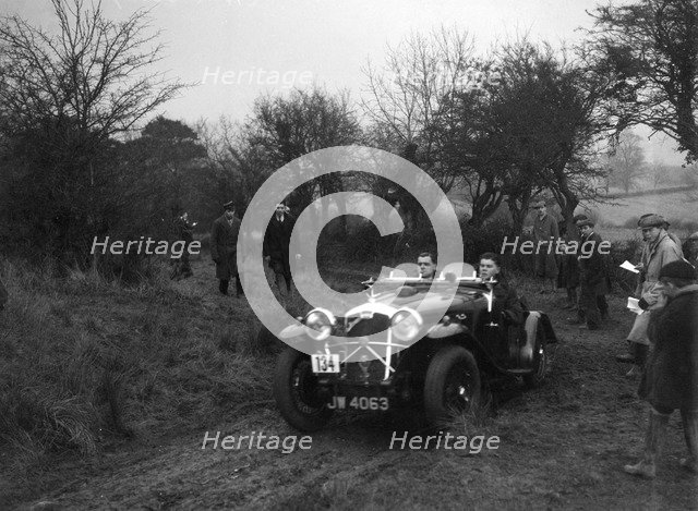 Wolseley Hornet of HK Crawford at the Sunbac Colmore Trial, near Winchcombe, Gloucestershire, 1934. Artist: Bill Brunell.