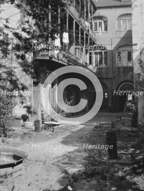 Courtyard, New Orleans, between 1920 and 1926. Creator: Arnold Genthe.