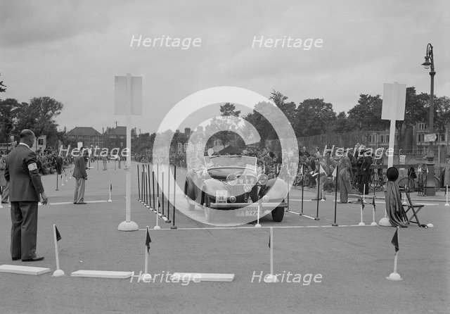 Jensen open 4-seater of Ken Crawford competing in the South Wales Auto Club Welsh Rally, 1937 Artist: Bill Brunell.