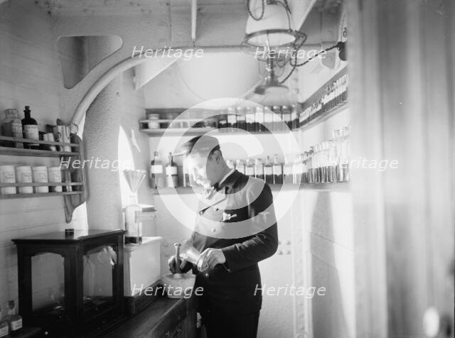 U.S.S. Newark, the apothecary, between 1891 and 1901. Creator: Unknown.