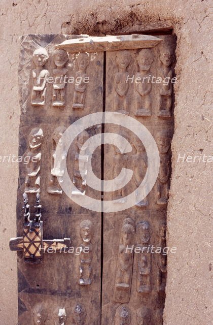 Carved wooden door, Pays Dogon, Mali, 1990. Creator: Amanda Waite.