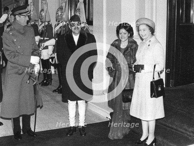 The Queen and Prince Philip with the King and Queen of Nepal, Buckingham Palace, 1980. Artist ...