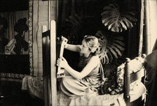 Lydia Delectorskaya preparing a canvas in Matisse’s studio, Place Charles-Félix, Nice, 1936. Creator: Matisse, Henri (1869-1954).