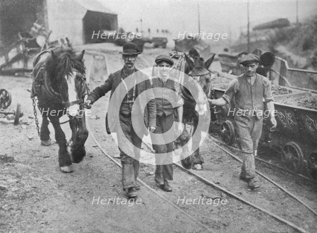 'After the settlement: Miners taking their ponies back to the pit', 1915. Artist: Unknown.