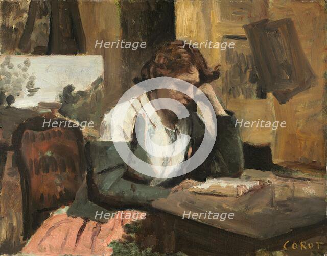 Woman Reading in the Studio, c. 1868. Creator: Jean-Baptiste-Camille Corot.