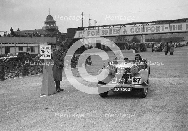 Riley Lynx competing in the JCC Rally, Brooklands, Surrey, 1939. Artist: Bill Brunell.