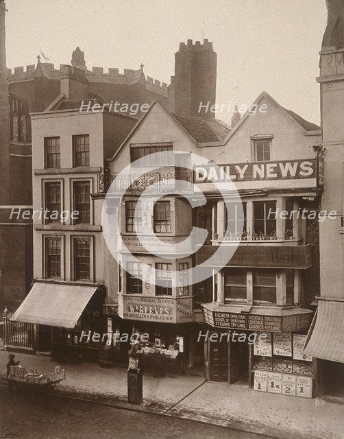 Figures standing near a shop front on Macclesfield Street, Soho, London, 1883. Artist: Henry Dixon