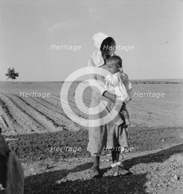 Mother and child of flood refugee family, near Memphis, Texas, 1937. Creator: Dorothea Lange.