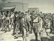 'The Last Attack on Mafeking: B.S.A. Police Escorting Boer Prisoners to the Gaol', 1901. Creator: Henry Marriott Paget.