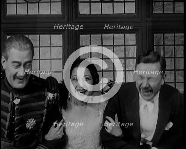 The Female Actor Josie Collins Performing in  a Play With Two Male Actors, 1920s. Creator: British Pathe Ltd.