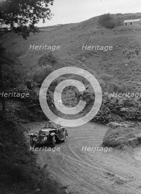1935 AC tourer taking part in a motoring trial, late 1930s. Artist: Bill Brunell.