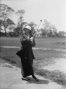Mrs. Mann Playing Golf, 1916. Creator: Harris & Ewing.