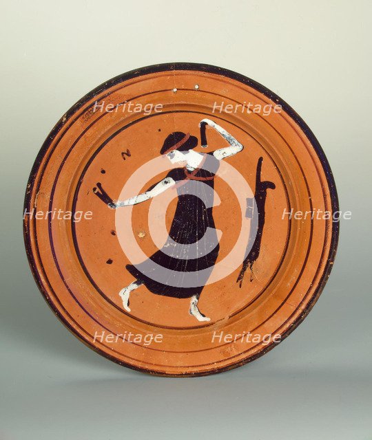 Plate with a dancing girl. Attic pottery.