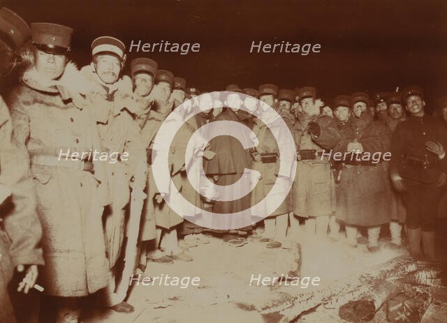 Flashlight - Jap soldiers at Chemulpo, after naval battle, standing around bonfire, c1904. Creator: Robert Lee Dunn.
