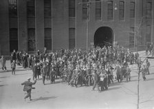 Employees of the Baldwin Locomotive works standing outside bldg., Philadelphia, 1910. Creator: Bain News Service.