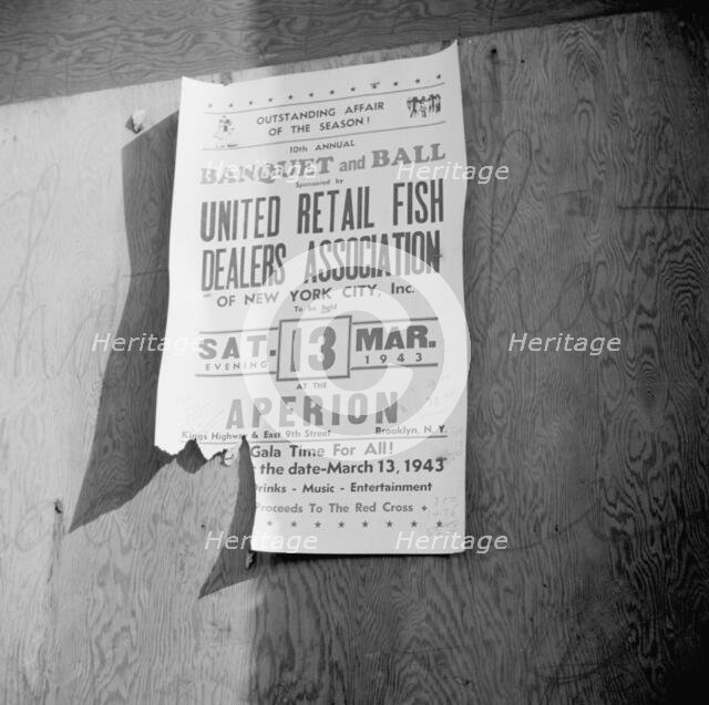 A sign at the Fulton fish market advertising a fish dealers' banquet and hall, New York, 1943. Creator: Gordon Parks.