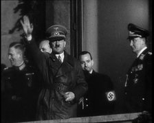 Adolf Hitler, the German Leader, Saluting the Crowd with Hermann Goering and..., 1937. Creator: British Pathe Ltd.