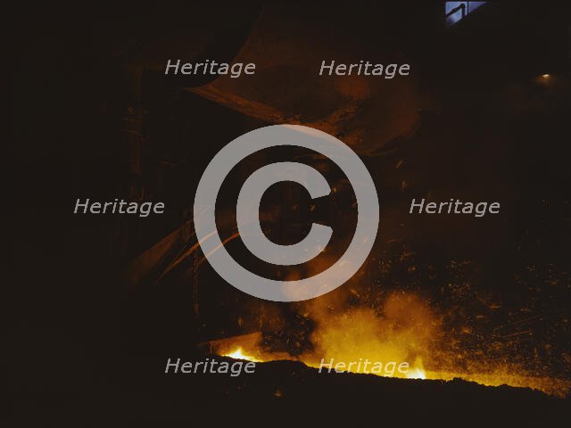 Slag run-off from open hearth furnace, Republic Steel Corp., Youngstown, Ohio, 1941. Creator: Alfred T Palmer.