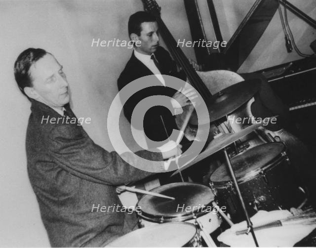 Phil Seamen and Jeff Clyne, Ronnie Scotts, Gerrard Street, London, 1959. Creator: Brian Foskett.