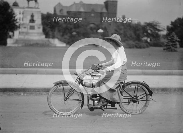 Woman On Bicycle, 1917 or 1918. Creator: Unknown.