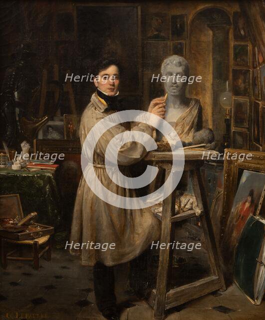 Jean-Pierre Dantan (1800-1869), in his studio, modelling the bust of Lepaulle, c1835. Creator: Francois-Gabriel-Guillaume Lepaulle.