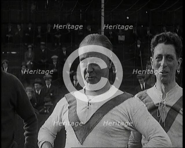 The Comedian George Robey Pulling Faces On a Football Pitch in Front of a Large Crowd, 1920s. Creator: British Pathe Ltd.
