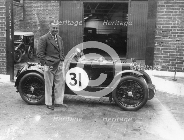 Cyril Paul with his MG C type, 1932. Artist: Unknown