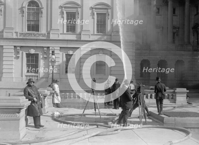 U.S. Capitol - Cleaning Exterior, 1913. Creator: Harris & Ewing.