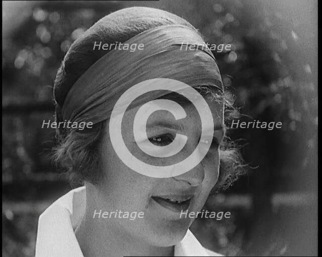 A Close up Shot of Betty May Nuthall Shoemaker, the British  World Top Female Tennis Player, 1920. Creator: British Pathe Ltd.