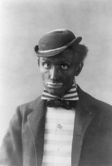 Man in blackface as minstrel, between c1890 and c1910. Creator: Frances Benjamin Johnston.