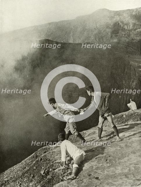'At the Crater's Brink, Aso-San', 1910. Creator: Herbert Ponting.