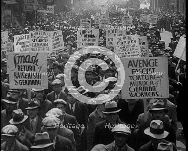 American anti-fascists Marching and Holding Signs, 1933. Creator: British Pathe Ltd.