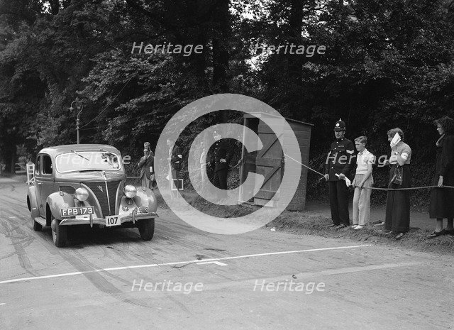 Ford V8 of J Harrison, winner of a bronze award at the MCC Torquay Rally, July 1937. Artist: Bill Brunell.