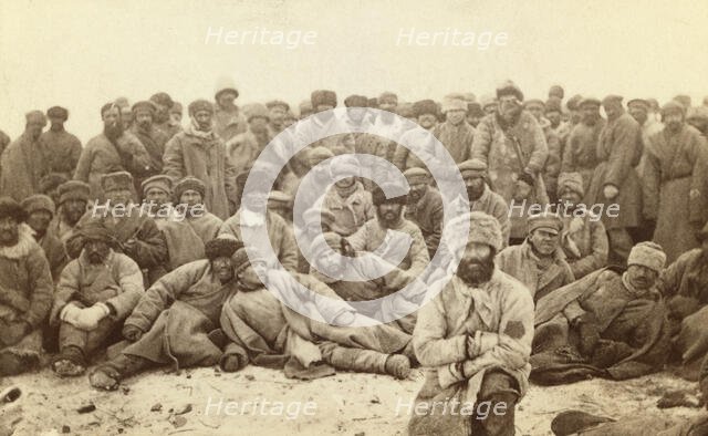 Group portrait of large group of convicts, between 1880 and 1886. Creator: Unknown.