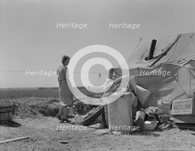 Young family just arrived from Arkansas camped along the road, Imperial Valley, California, 1937. Creator: Dorothea Lange.