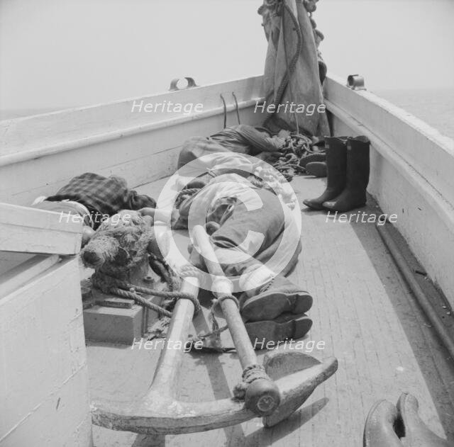A fisherman's work is hard and many times they fall exhausted..., Gloucester, Massachusetts, 1943. Creator: Gordon Parks.