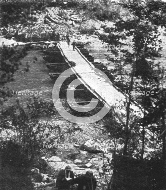 Italian Offensive of the Isonzo; Decking is laid over the boats, 1917. Creator: Unknown.