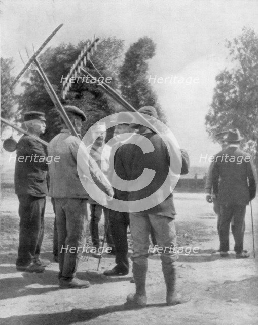 Georges Clemenceau talking with farmers near the front, Chemin des Dames, France, 1918. Artist: Unknown