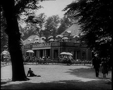 People Walking and Relaxing in the Park, 1933. Creator: British Pathe Ltd.